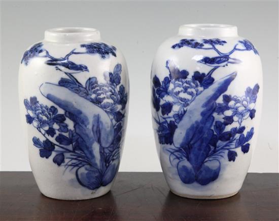 A pair of Chinese blue and white crackle glaze ovoid vases, early 20th century, 19.5cm